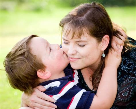 mom son kiss|Mother Son Sofa Kissing stock videos and footage